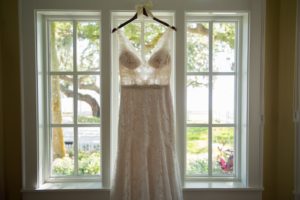 Illusion Lace Bodice Rhinestone Belted Blush Paloma Blanca Wedding Dress on Custom Hanger with White Ribbon