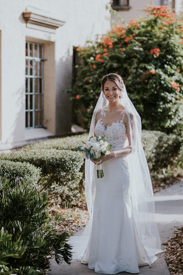 Outdoor Garden Bridal Portrait in Illusion Lace Sweetheart Column Essence of Australia Wedding Dress | Tampa Bay Wedding Photographer Brandi Image Photography
