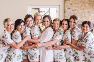 Indoor Bridal Party Getting Ready Portrait in Matching Blush pInk and Greenery Floral Pajamas