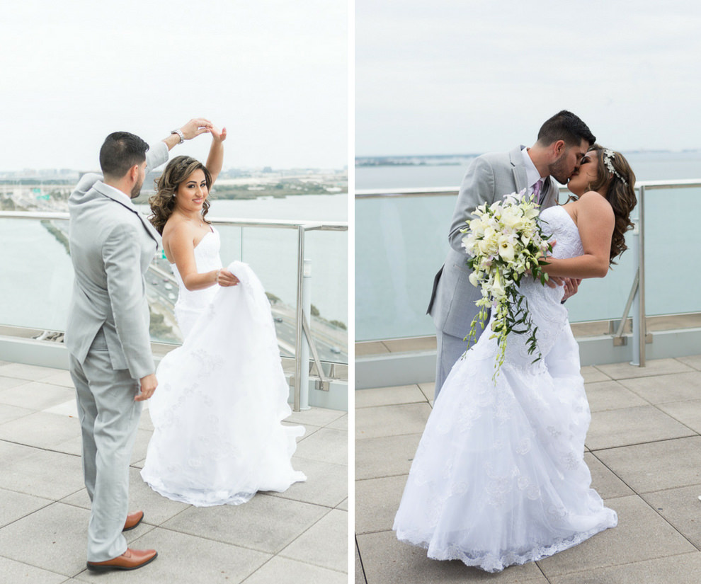 Outdoor Waterfront First Look Wedding Portrait, Bride in Strapless Belted Mermaid David's Bridal Dress, with White Floral Hair Accessory and White and Greenery Bouquet, Groom in Light Gray Suit | Hotel Reception Venue The Westin Tampa Bay