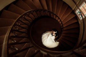 Creative Architectural Wedding Portrait with Spiral Staircase