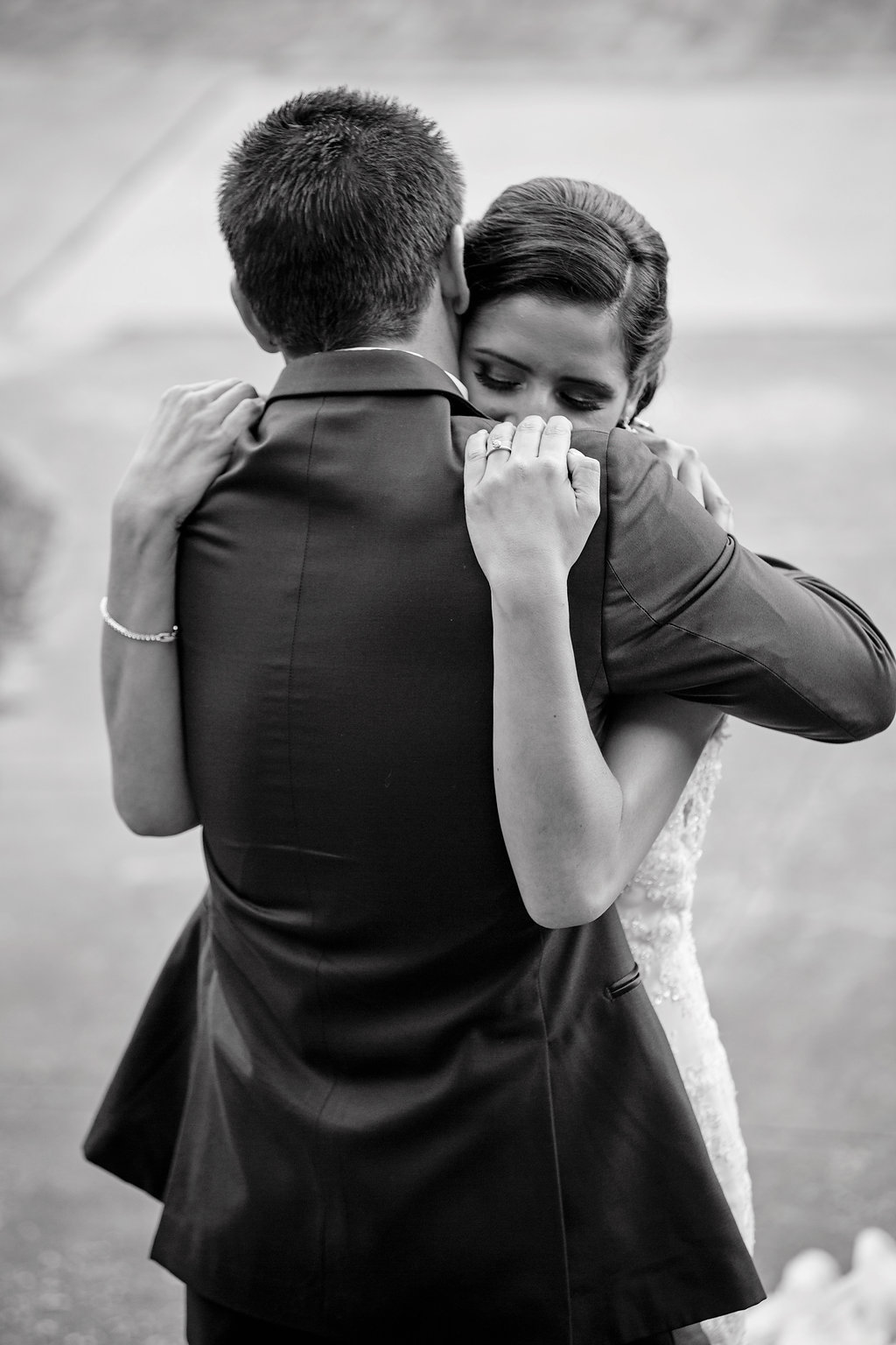 Black and White Outdoor Bride and Groom Wedding Portrait Groom Wearing Tuxedo and Bride Wearing Strappy White Lace Wedding Dress | Tampa Bay Photographer Marc Edwards Photographs