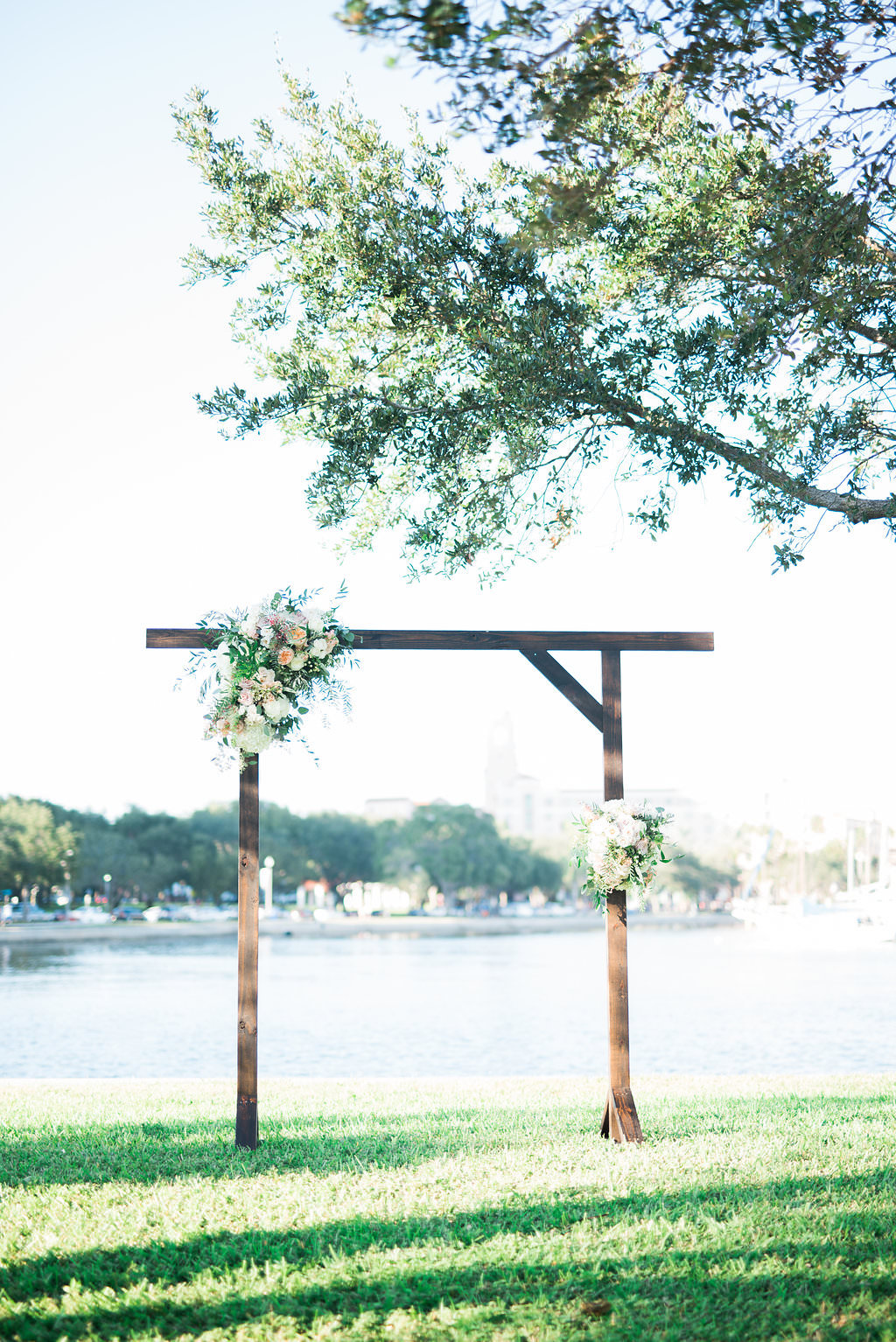 Waterfront Outdoor Vintage Wedding Ceremony Wooden Arch with Organic Bouquets