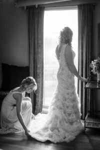 Black and White Bride Getting Ready Portrait in Fit and Flare Lace and Ruffle Skirt Wedding Dress with Tank Top Straps and Plunging V-Neckline | St. Pete Photographer Marc Edwards Photography