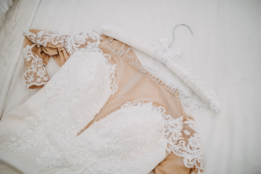 Lace Sleeve David's Bridal White and Nude Lace Wedding Dress on Personalized Hanger | Tampa Bay Wedding Photographer Rad Red Creative
