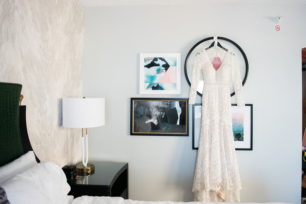 Lace Longsleeve V-Neck Wedding Dress on Hanger | Naples Wedding Photographer Kera Photography