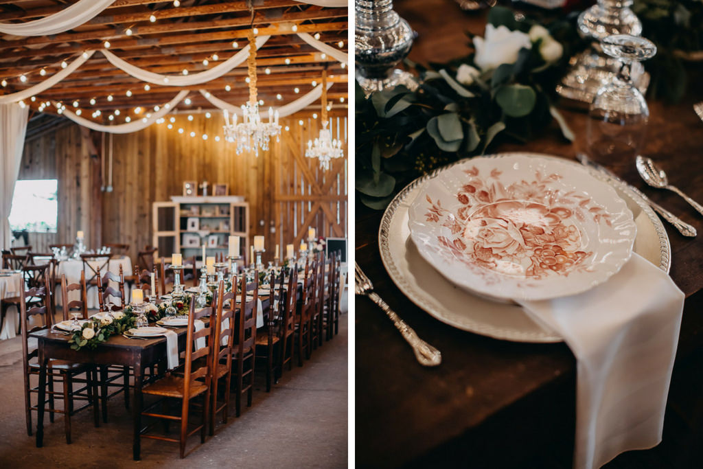 Indoor Rustic Barn Wedding Reception Decor with Crystal Chandeliers, String Market Lights and Draping, Long Wooden Feasting Tables with Greenery Garland Centerpiece and with Pillar Candles with Silver Candlestick Holders, White Napkins with Vintage China Plate Setting | Tampa Bay Wedding Photographer Rad Red Creative | Lithia Wedding Venue Southern Grace