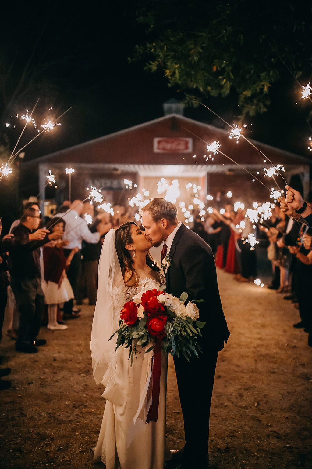 Rustic Barn Wedding Bride and Groom Sparkler Exit | Tampa Bay Wedding Photographer Rad Red Creative | Lithia Wedding Venue Southern Grace