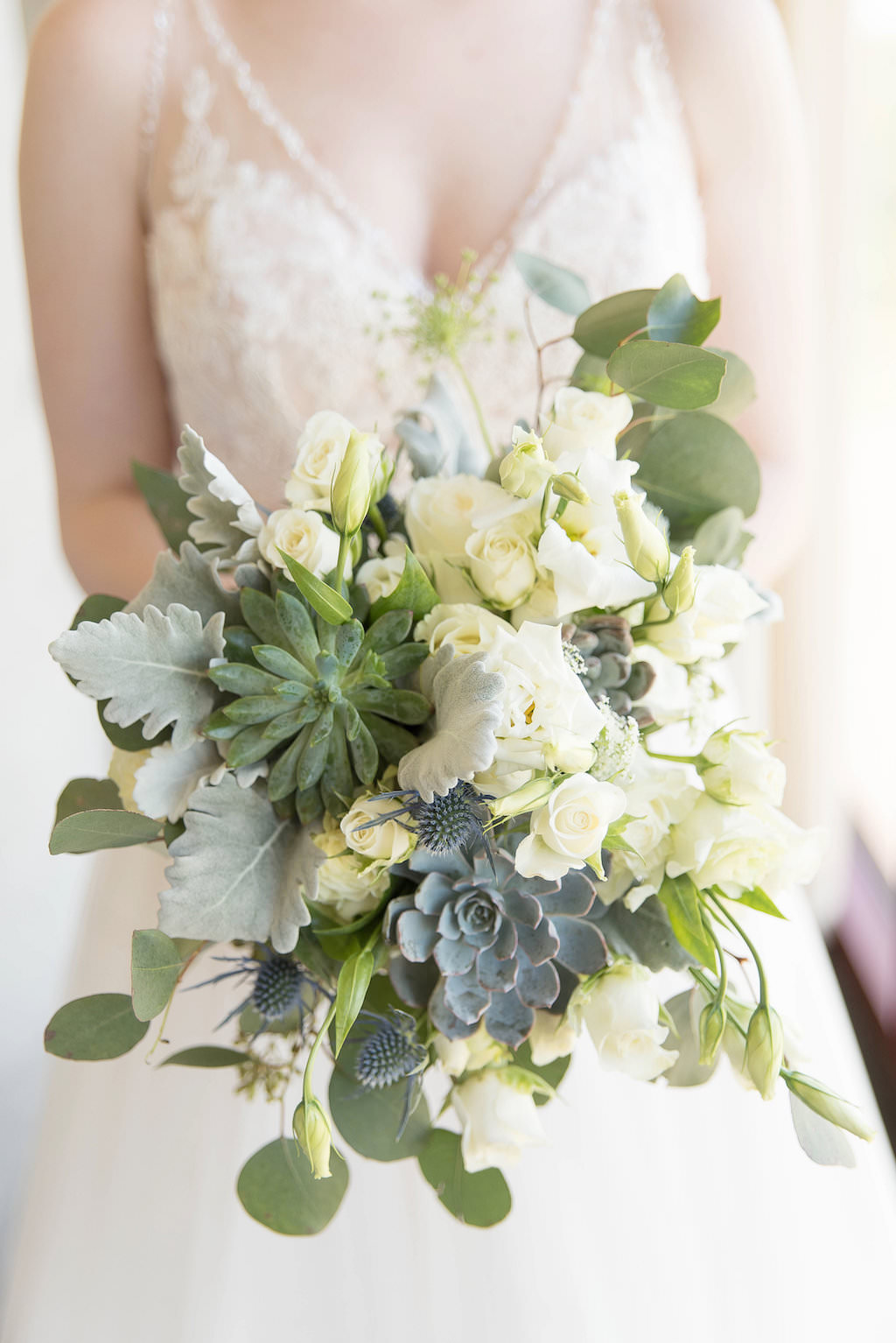 Indoor Bridal Portrait Watters Bride Plunge Line Lace Tank Strap Wedding Dress with White Roses Dusty Miller Succulents Bridal Bouquet | Tampa Bay Wedding Photographer Kristen Marie Photography