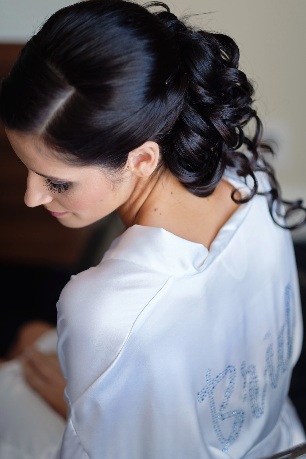 Black Haired Bride Getting Ready Portrait Curled Hair Updo