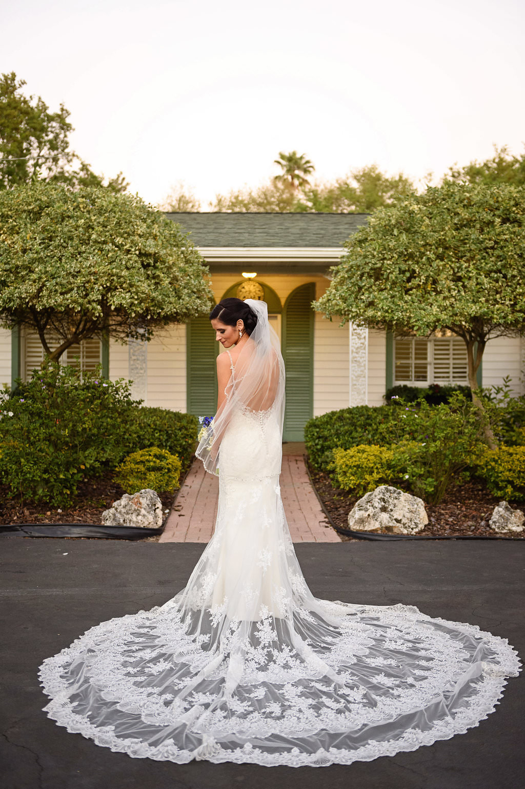 Outdoor Bridal Portrait in Low Back Lace Spaghetti Strap Kitty Chen Couture Wedding Dress and Veil | Tampa Bay Wedding Photographer Marc Edwards Photographs