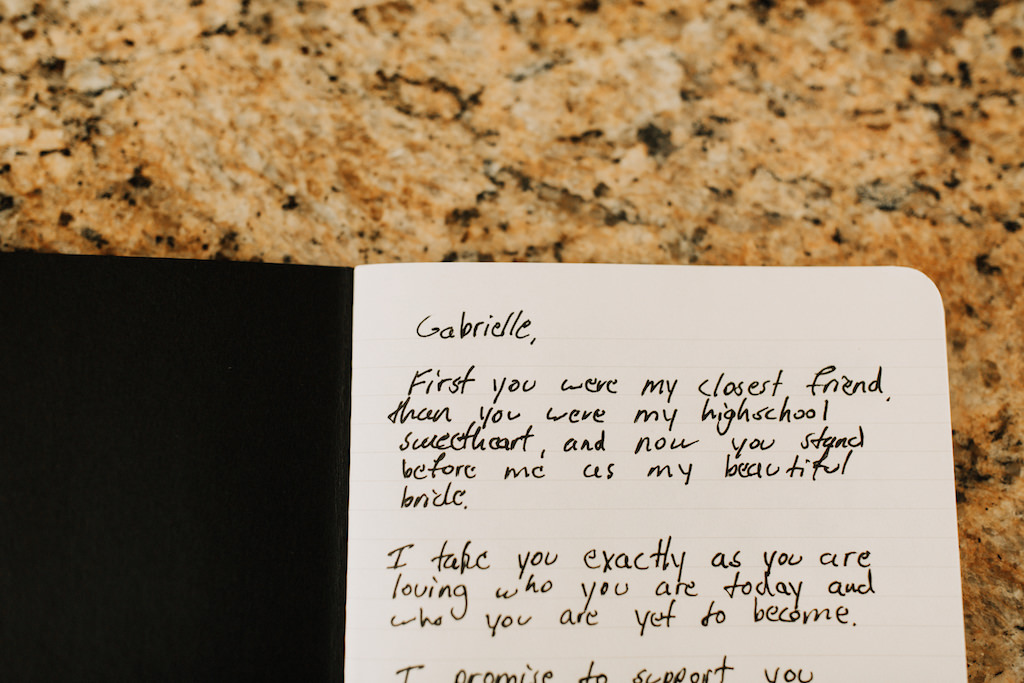 Groom's Handwritten Wedding Vows In Notebook