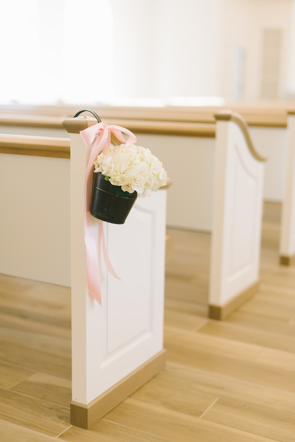 White Floral and Pink Ribbon Wedding Ceremony Decor | Safety Harbor Wedding Ceremony Venue Harborside Chapel | Clearwater Beach Photographer Kera Photography | Apple Blossoms Floral Designs