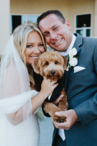 Bride and Groom Wedding Portrait with Dog in Tuxedo | St. Pete Beach Wedding Venue Isla Del Sol Yacht and Country Club | St. Petersburg Pet Wedding Planner Fairy Tail Petcare