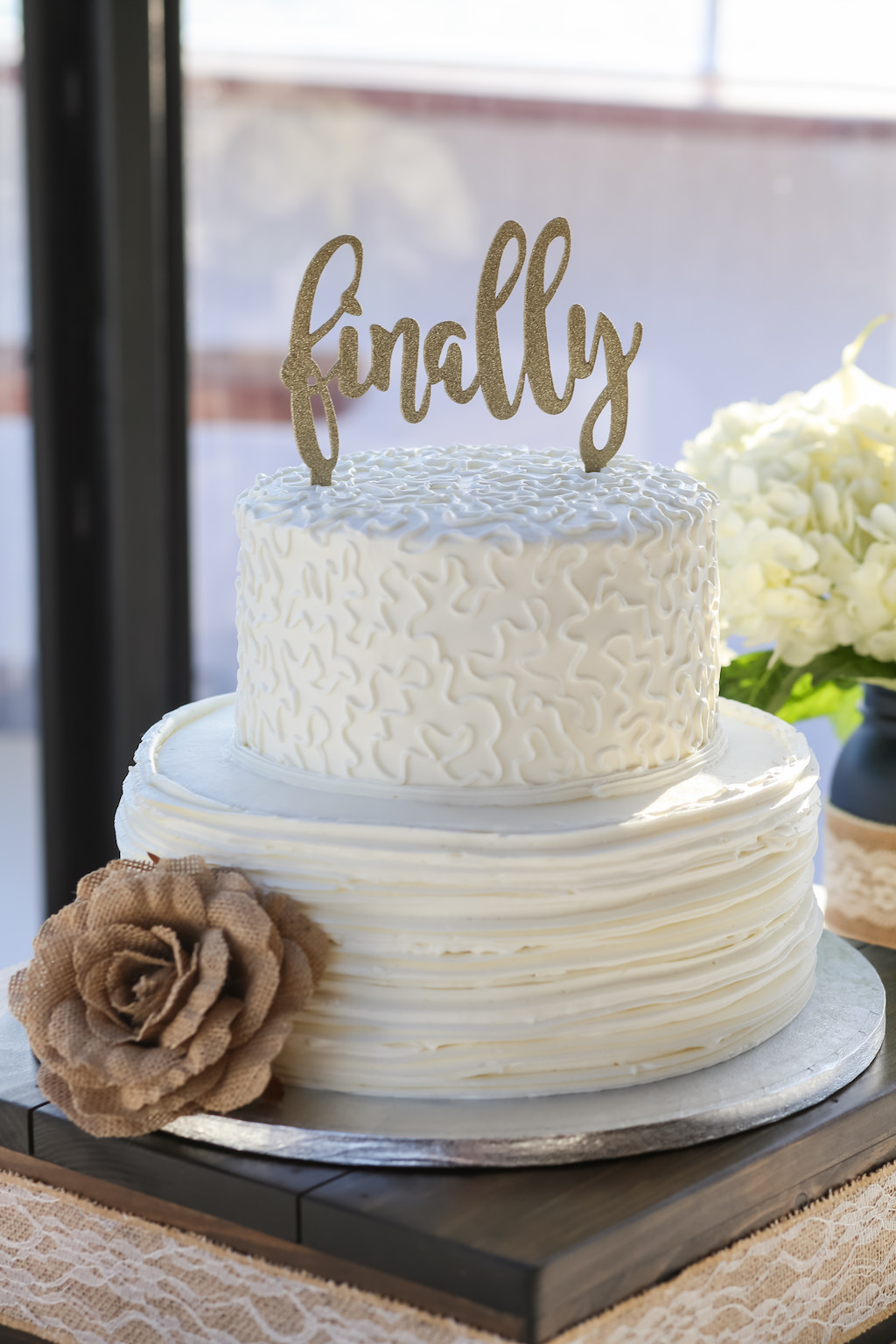 Two Tiered Round White Wedding Cake with Gold Fabric Rose and Gold Glitter Laser Cut Cake Topper | Tampa Bay Unique Waterfront Nautical Wedding Venue Yacht Starship | Tampa Bay Wedding Photographer Lifelong Photography Studios