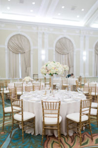 Ballroom Wedding Reception Decor with Round Tables, Gold Chiavari Chairs, Tall White and Blush Pink Floral Centerpieces, White Table Linens | St. Petersburg Wedding Venue The Vinoy Renaissance