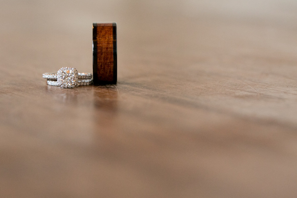Cushion Halo Diamond Engagement Ring, Diamond Wedding Ring, and Wood Groom Wedding Ring | Tampa Bay Wedding Photographer Carrie Wildes Photography