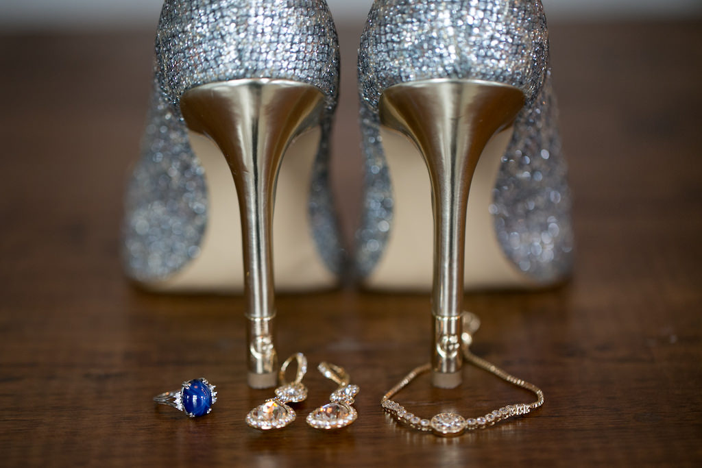 Getting Ready Portrait: Silver Glitter Stiletto Wedding Shoes, Gold Diamond Teardrop Earrings, Blue Encrusted Ring, Gold and Diamond Bracelet | Tampa Bay Wedding Photographer Carrie Wildes Photography