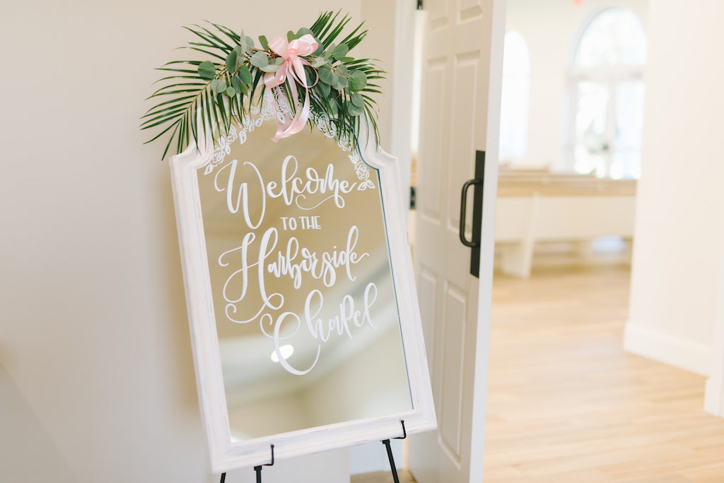Wedding Ceremony Welcome Sign on White Mirror Greenery | Tampa Bay Wedding Venue Harborside Chapel | Tampa Bay Photographer Kera Photography