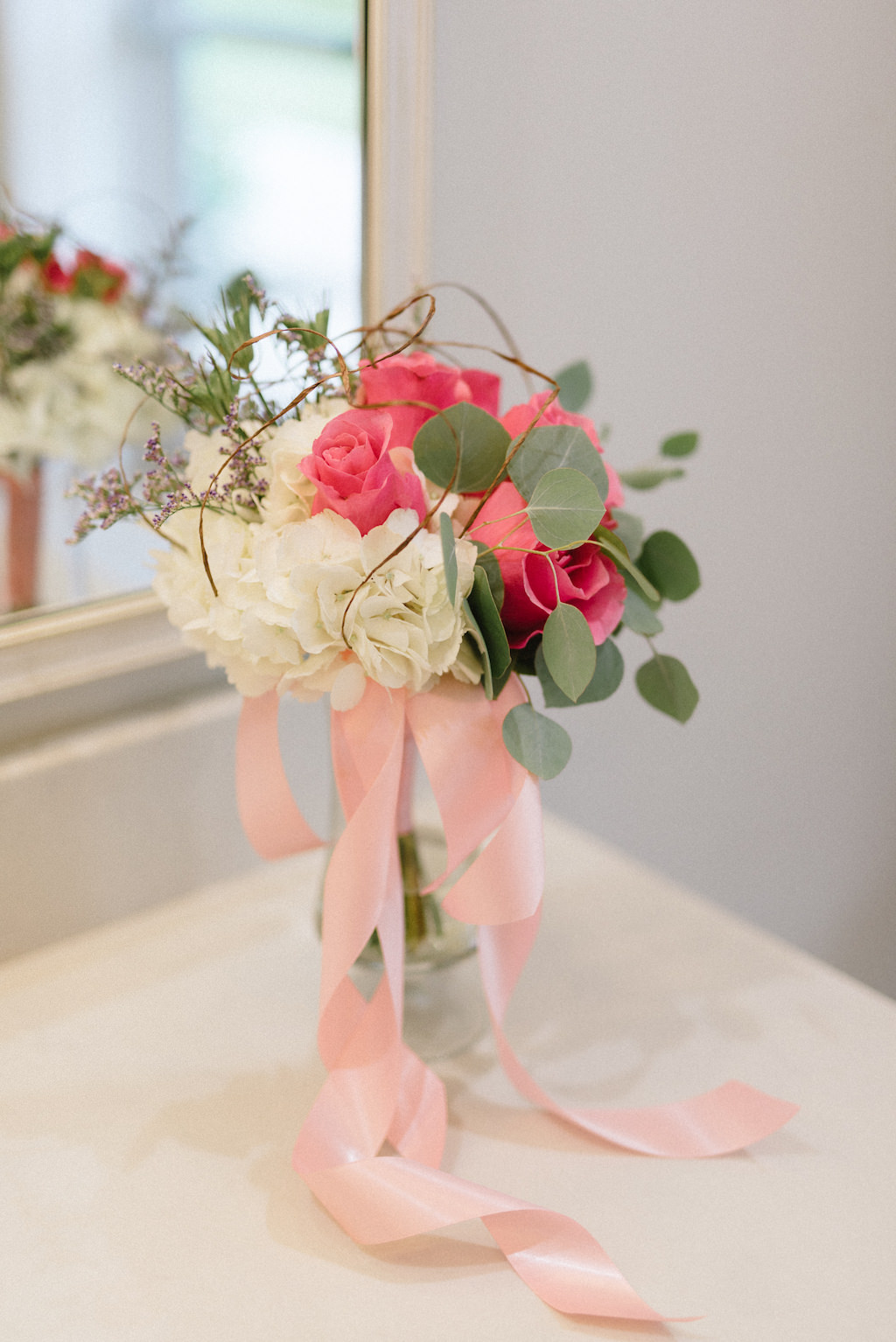 Simple Wedding Ceremony Decor, White Hydrangea, Pink Roses and Greenery Floral Bouquet with Blush Pink Ribbon in Glass Vase | St Pete Florist Apple Blossoms Floral Designs | Tampa Wedding Photographer Kera Photography