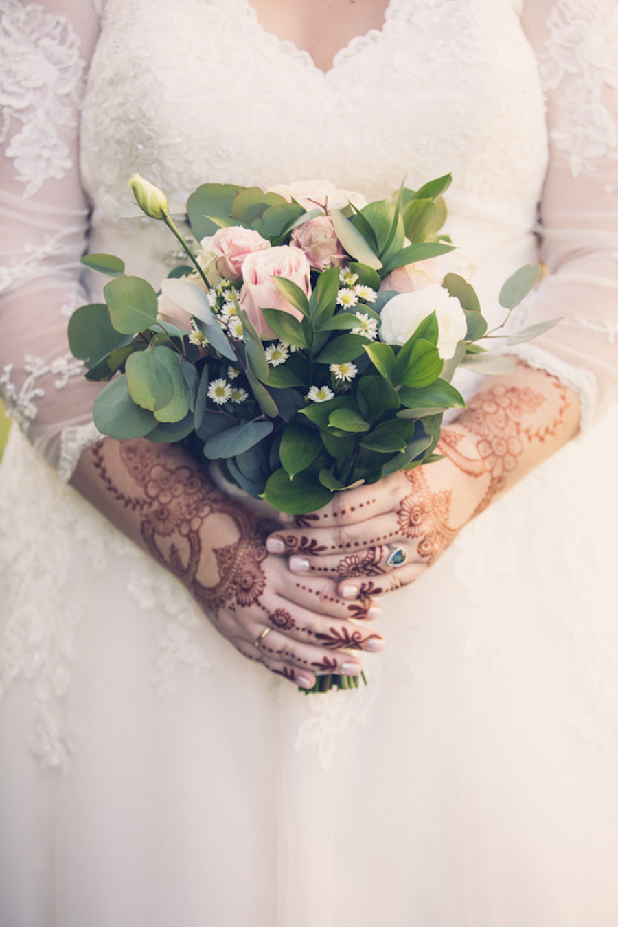 Bridal Portrait with Indian Henna and Long Sleeve Illusion, V-Neck Lace and Rhinestone Floral Accent Wedding Dress with Blush Pink and White Rose and Greenery Floral Bouquet | Tampa Bay Wedding Photographer Luxe Light Photography