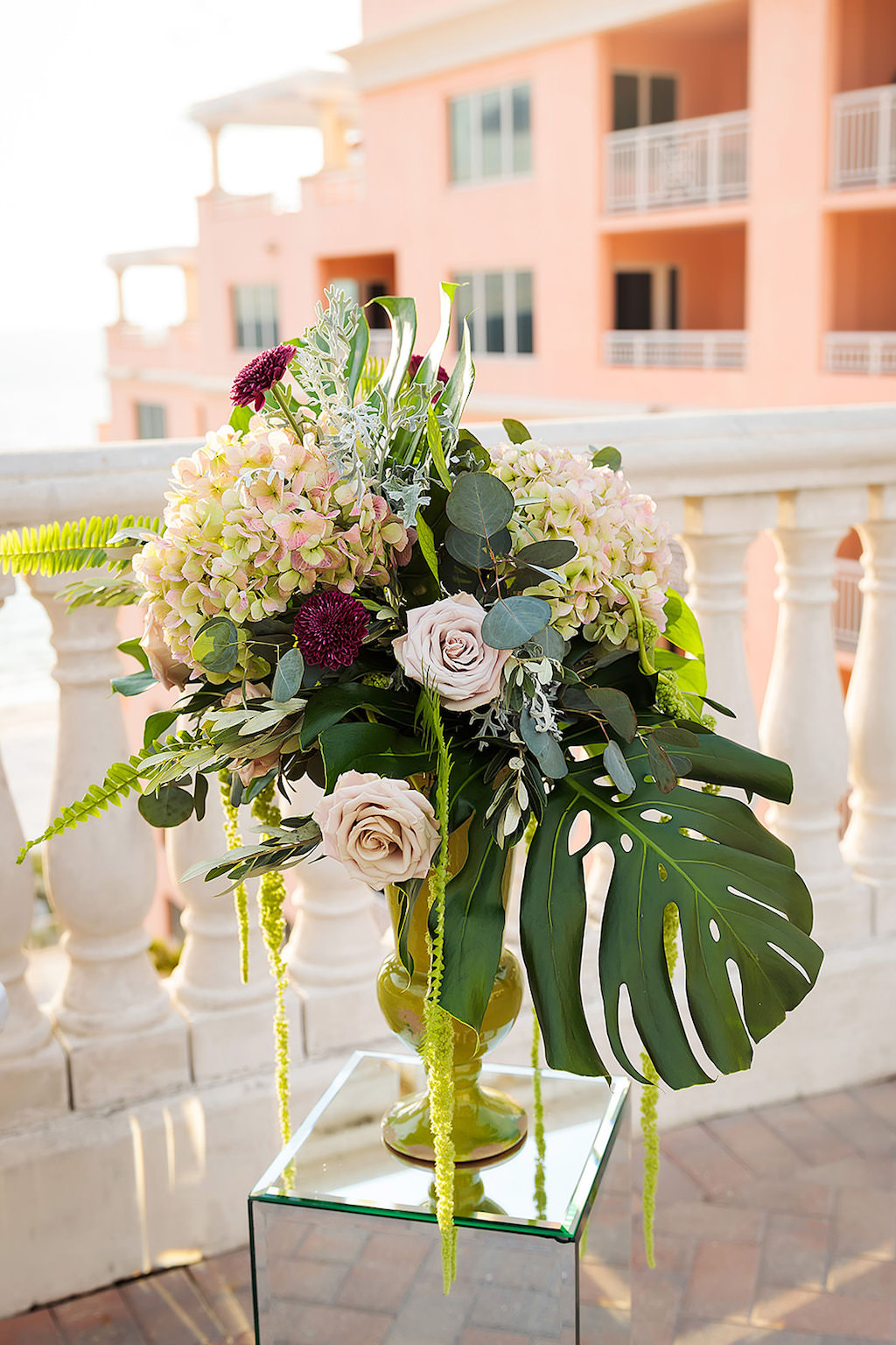 Romantic Outdoor Rooftop Terrace Wedding Ceremony Decor, Mirror Pedestals with Tall Gold Vases and Blush Pink Roses, Hydrangeas, Amaranthus, Monstera Leaves and Greenery | Venue Hyatt Regency Clearwater Beach