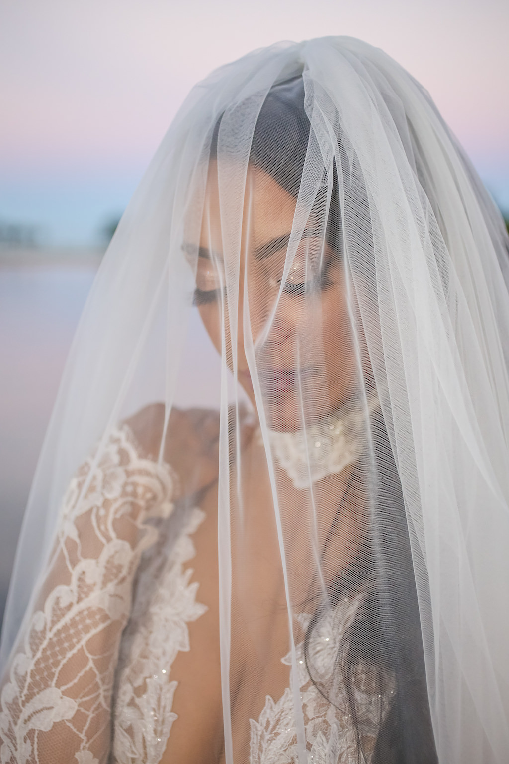 Creative Bridal Portrait Under Veil in Lace and Sheer Long Sleeve High Neck Wedding Dress | St. Petersburg Photographer Lifelong Photography Studios