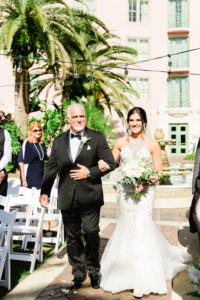 Bride Walking Down the Aisle with Father Ceremony Portrait, with White Rose and Greenery Bouquet, Bride in Fit and Flare Lace Halter Bodice Wedding Dress | Tampa Bay Wedding Photographer Ailyn La Torre | Venue The Vinoy Renaissance St. Petersburg Resort & Golf Club | Tampa Hair Artist Femme Akoi