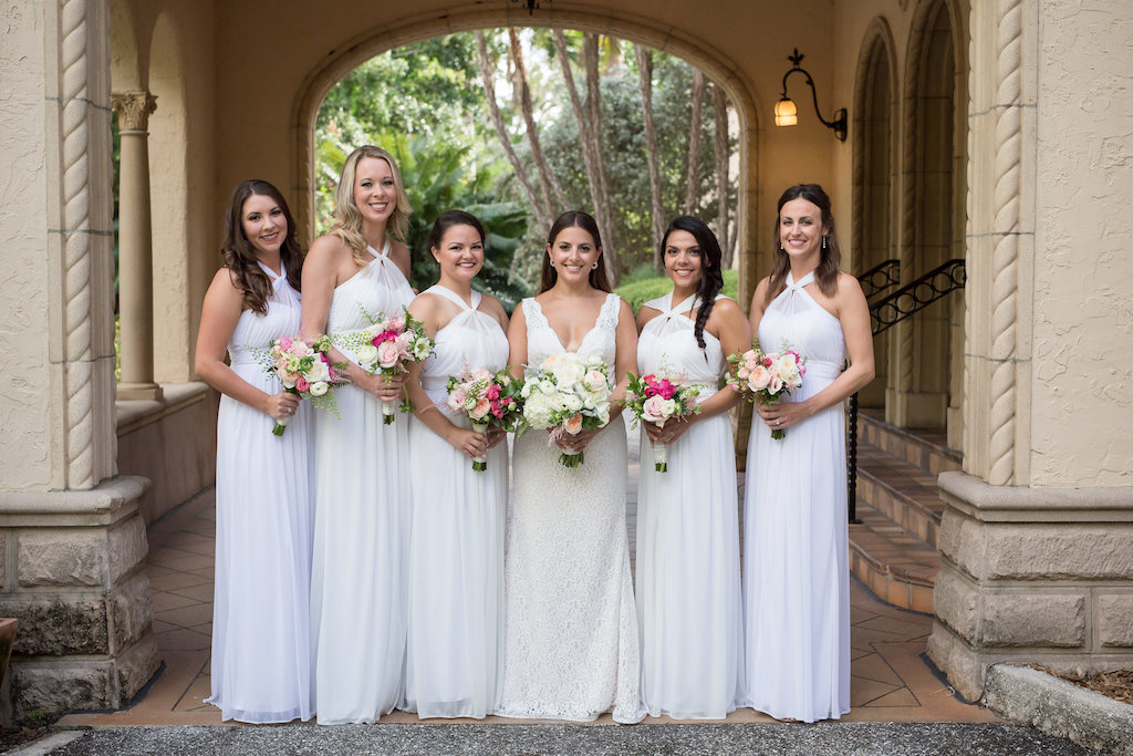 Outdoor Bride and Bridesmaids Wedding Portrait, Bridesmaids in Mismatched White Dresses with Pink and Greenery Floral Bouquets, Bride in Lace Tank Top Strap Plunging V Neckline Wedding Dress with White, Blush Pink and Greenery Bouquet | Tampa Bay Photographer Cat Pennenga Photography | Sarasota Venue Powel Crosley Estate