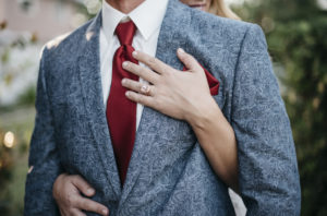Outdoor Bride and Groom Wedding Portrait, Groom in Blue Paisley Suit with Burgundy Tie and Pocket Square, Bride Rose Gold Engagement Ring | Sarasota Wedding Planner Kelly Kennedy Weddings and Events