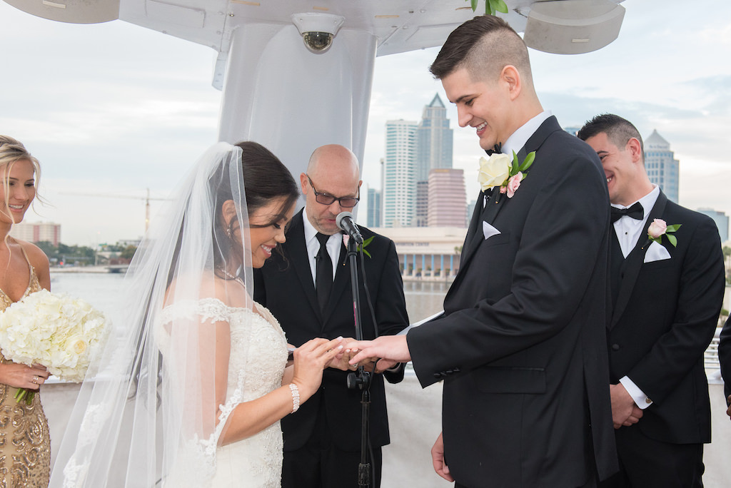 Outdoor Wedding Ceremony Bride and Groom Exchanging Rings Portrait | Tampa Bay Nautical Wedding Venue Yacht StarShip