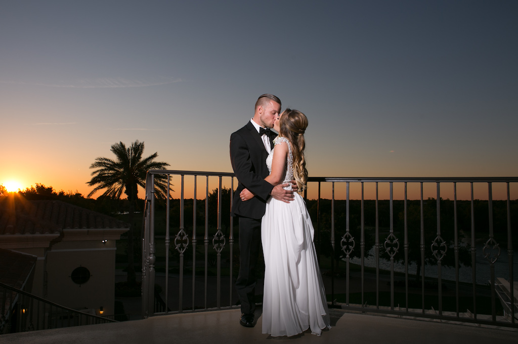 Intimate Sunset Outdoor Bride and Groom Wedding Portrait on Balcony | Sarasota Wedding Photographer Carrie Wildes Photography