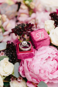 Velvet Dark Pink Ring Box with Wedding and Engagement Ring on Bed of Flowers, Pink Peony, White Roses, and Dark Purple Flowers | Tampa Bay Wedding Planner Burlap to Lace