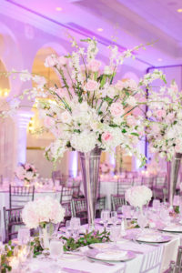 Elegant Ballroom Reception Decor, Long Banquet Table, White Linen, High and Low White and Blush Pink Floral Centerpieces in Silver Vase, Purple/Pink Uplighting, Silver Chiavari Chairs | Tampa Wedding Photographer Ailyn La Torre | Venue The Vinoy Renaissance St. Petersburg Resort & Golf Club