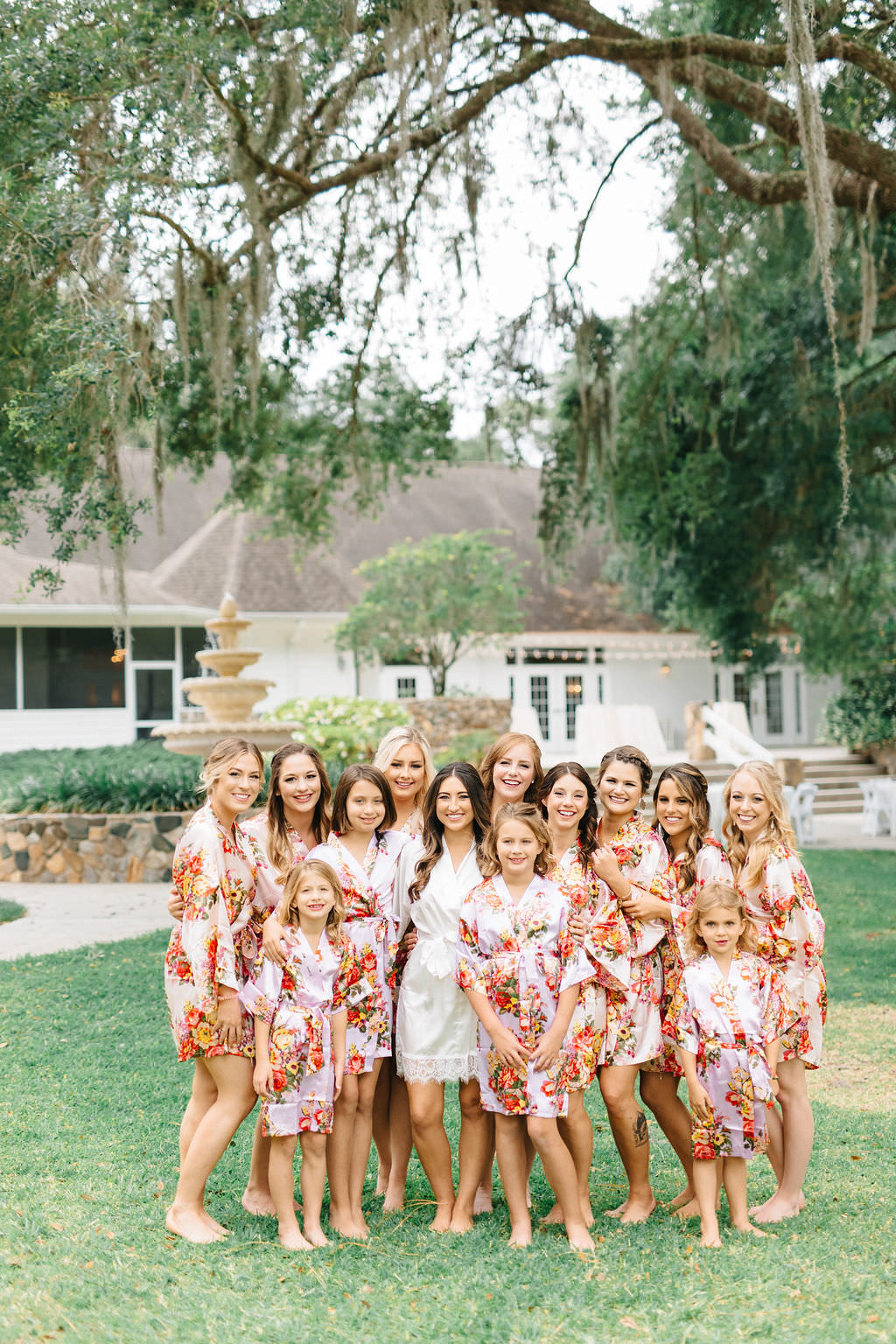 Outdoor Bride and Bridesmaids Getting Ready Portrait in Pink Floral Silk Robes | Tampa Bay Venue The Lange Farm