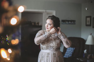 Bride Getting Ready Wedding Portrait in Vintage Long Sleeve Cream Floral and Beading Embellished Wedding Dress with Satin Belt | Tampa Bay Wedding Hair and Makeup Femme Akoi