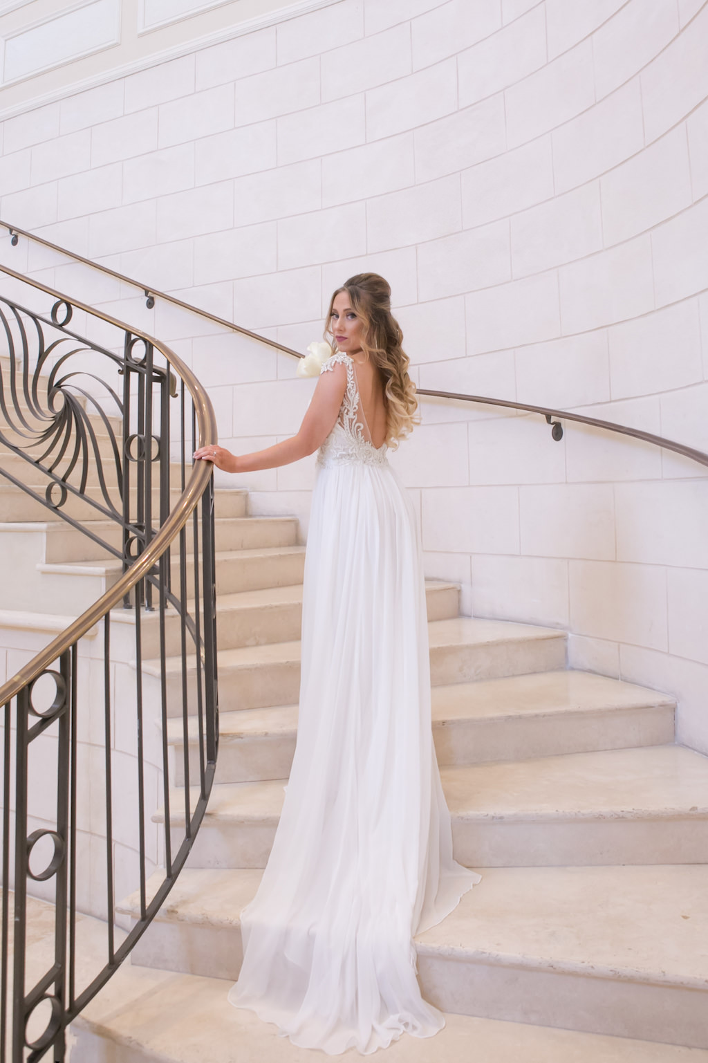 Bridal Portrait on Staircase in Maggie Sottero A-Line Illusion Tank Top Low-Back Wedding Dress with Lace Applique and Rhinestone Beaded Bodice | Sarasota Wedding Photographer Carrie Wildes Photography