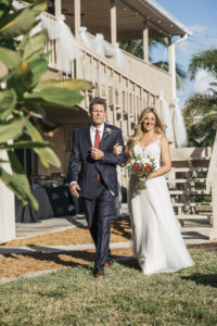 Outdoor Bride Walking with Father Down the Aisle Ceremony Portrait