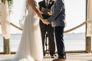 Outdoor Waterfront Bride and Groom Wedding Ceremony Portrait | Sarasota Wedding Planner Kelly Kennedy Weddings and Events