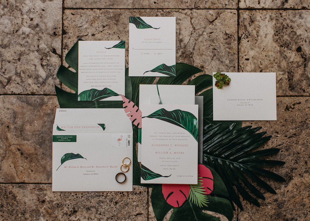 Tropical Inspired Wedding Invitation Suite with Wedding Rings on Palm Tree Leaves | Tampa Bay Photographer Rad Red Creative