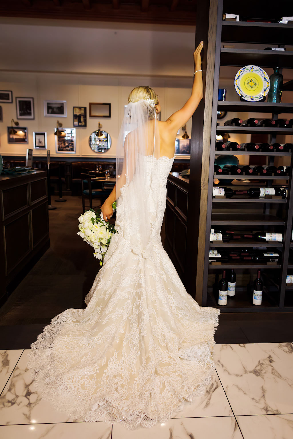 Bride Wedding Portrait in Strapless Lace Fit and Flare Wedding Dress with Veil and White Orchid Floral Bouquet | Downtown Tampa Historic Wedding Venue Le Meridien