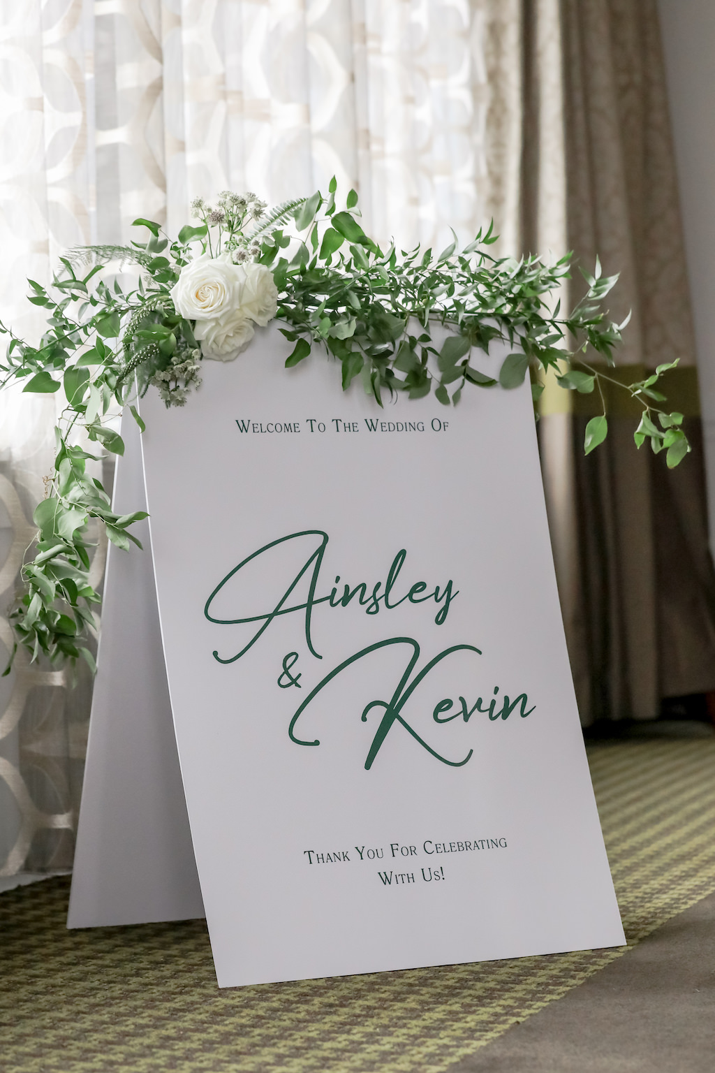 Wedding Ceremony Decor, White and Green Font Custom A-Frame Wedding Sign with White Roses and Greenery Garland | Tampa Bay Photographer Lifelong Photography Studios | Stationary/Signage Sarah Bubar Designs | Planner Parties A'La Carte | Florist Cotton and Magnolia
