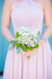 Bridesmaid in Dusty Rose High Neckline Dress with Baby's Breathe Bouquet