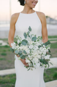 Outdoor Bridal Wedding Portrait in Sleek White High Neckline Wedding Dress with White and Greenery Floral Bouquet | St. Petersburg Hair and Makeup Femme Akoi
