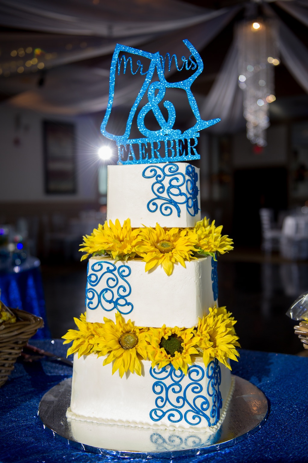 Three Tier White and Blue Wedding Cake with Yellow Sunflower Layers and Custom Sparkle Blue Laser Cut Cake Topper | Tampa Bay Photographer Andi Diamond Photography | Tampa Baker A Piece of Cake