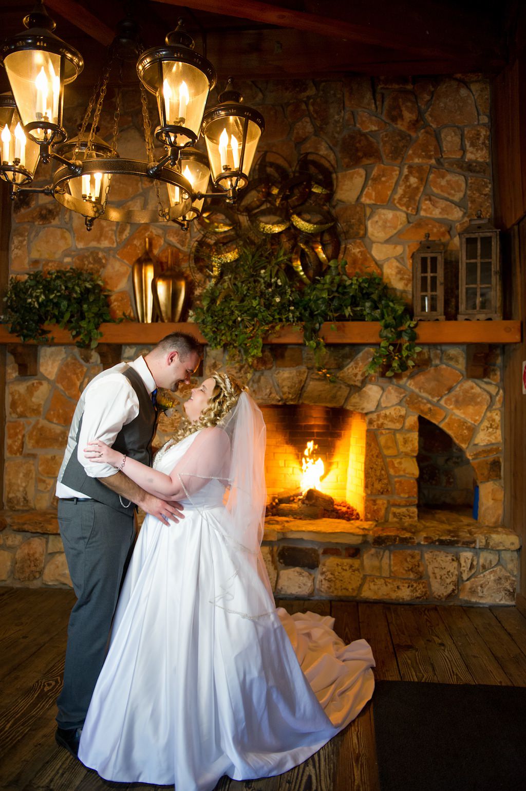 Rustic Bride and Groom Wedding Portrait in Front of Brick Fireplace | Tampa Bay Photographer Andi Diamond Photography | Tampa Venue Rusty Pelican