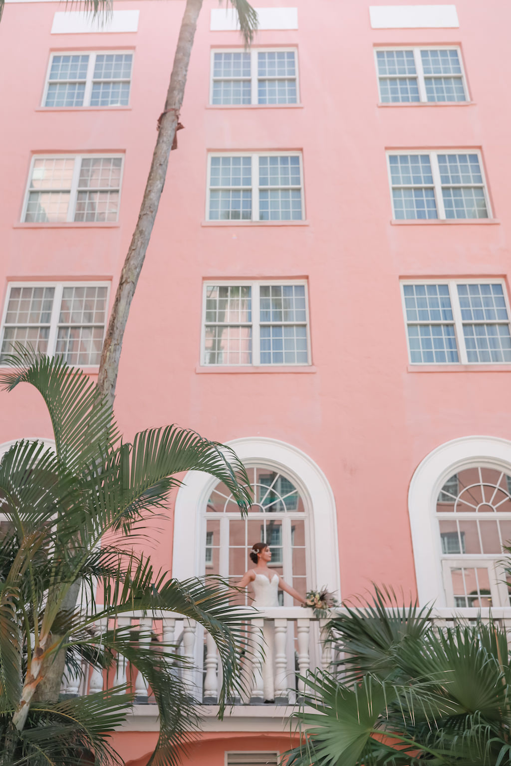 Bride in Wedding Dress by Truly Forever Bridal on Balcony | St. Petersburg Photographer Lifelong Photography Studios | St. Petersburg Historic Wedding Venue The Don Cesar | Instagram