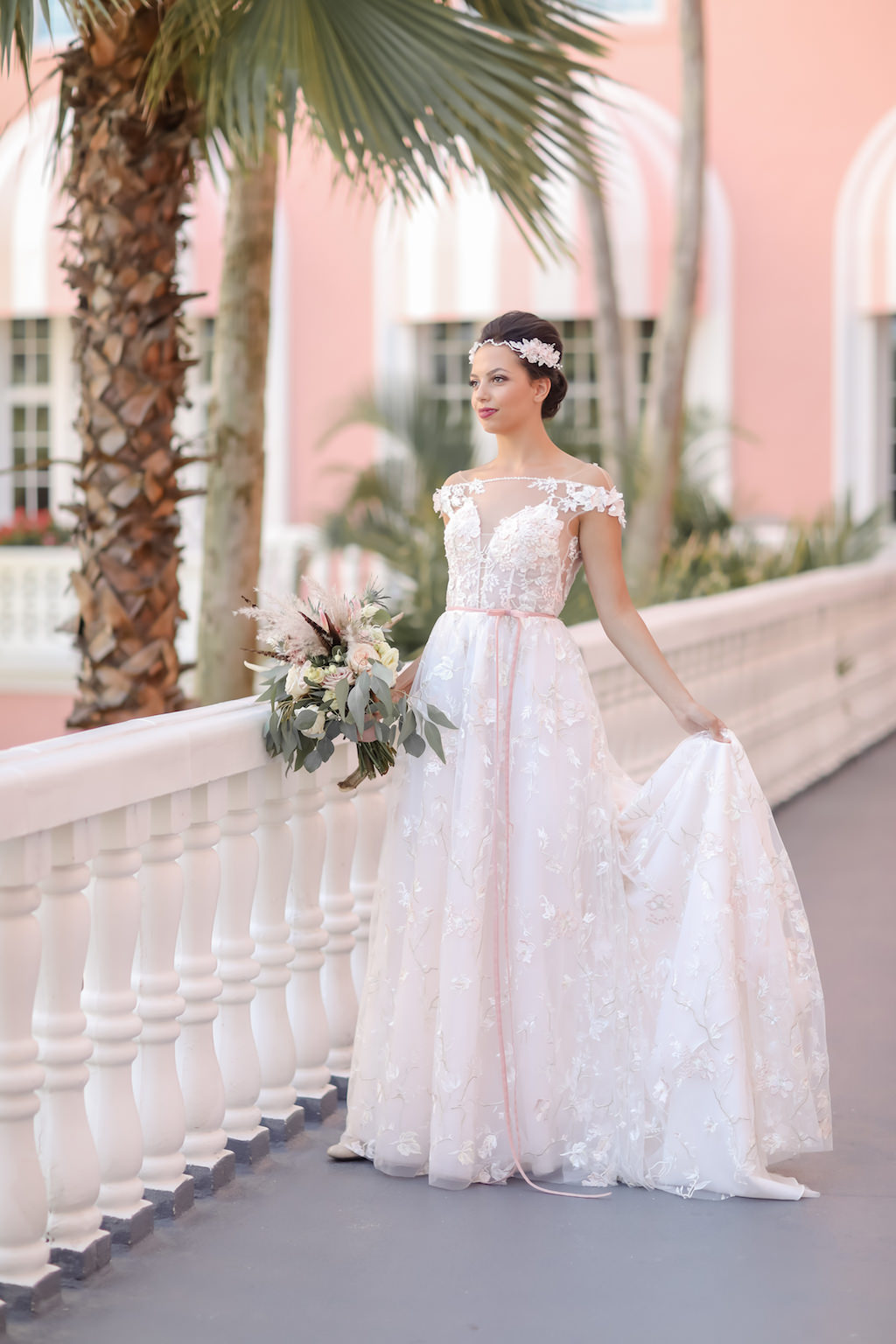 Bride Portrait in Illusion and Floral Applique Empire Waist High Neck Wedding Dress with Blush Pink Ribbon and Ivory and Greenery Floral Bouquet | St. Petersburg Photographer Lifelong Photography Studios | Tampa Bay Wedding Dress Shop Truly Forever Bridal | St. Petersburg Historic Hotel The Don Cesar | Instagram