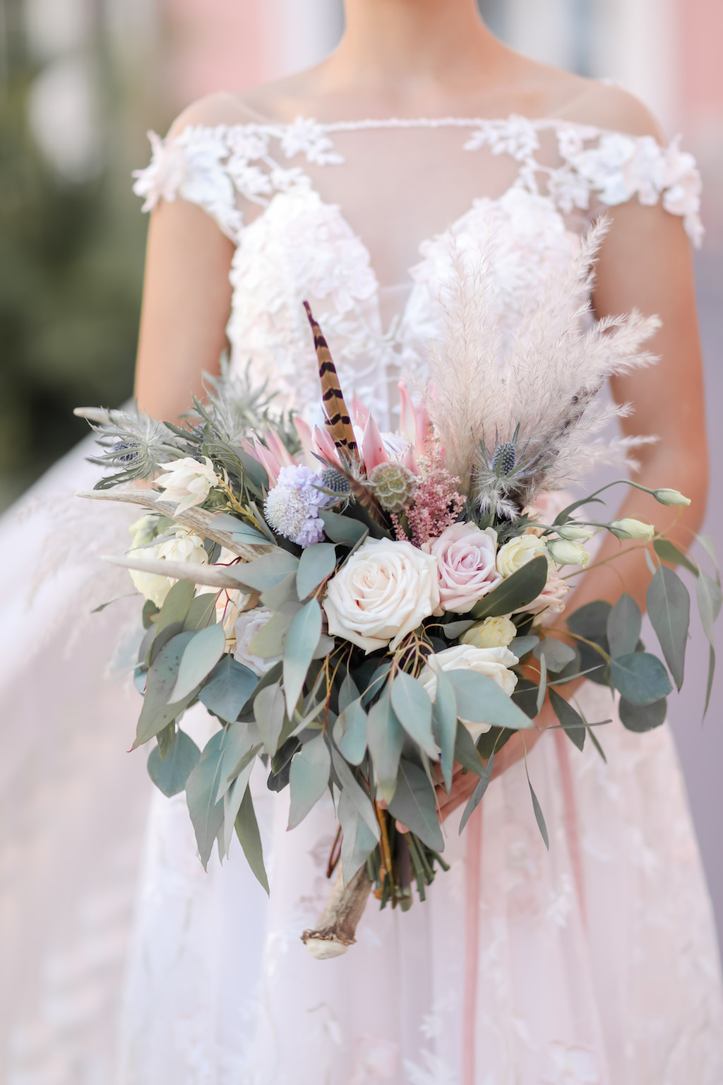 Bride Portrait in Illusion and Floral Applique, Strappy Rhinestone Back, Empire Waist High Neck with Lace Floral Cap Sleeve Wedding Dress with Blush Pink Ribbon and Ivory and Blush Pink Rose and Greenery Floral Bouquet | St. Petersburg Photographer Lifelong Photography Studios | Tampa Bay Wedding Dress Shop Truly Forever Bridal | St. Petersburg Historic Hotel The Don Cesar | Instagram