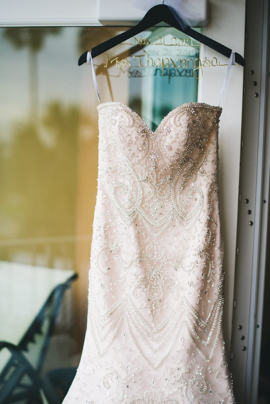 Sweetheart Strapless Rhinestone Beaded Wedding Dress on Custom Wooden and Gold Wire Hanger